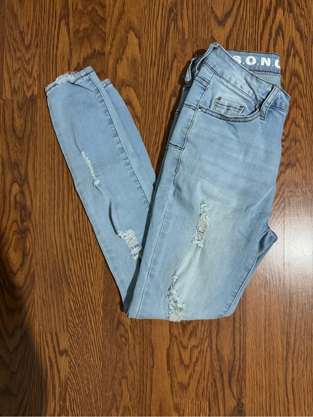 Women’s Light Blue Distressed Skinny Jeans